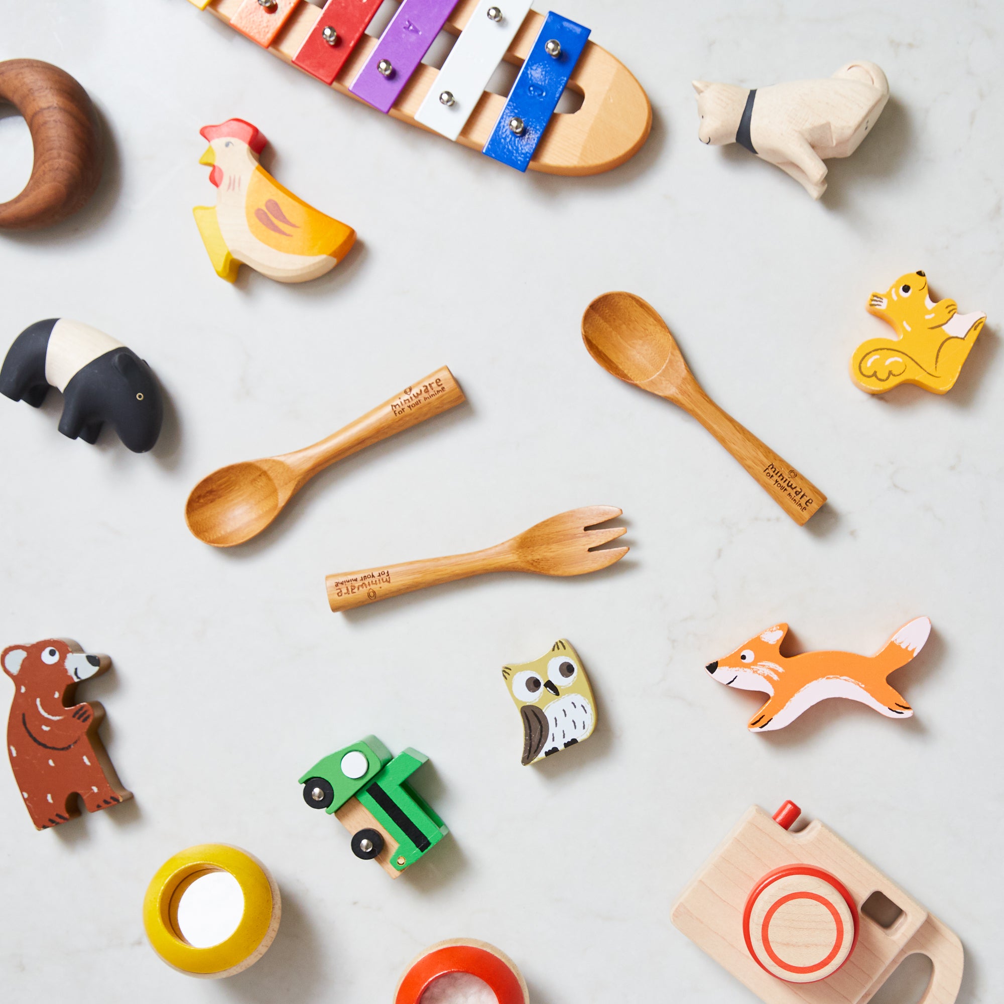 Miniware and toys displayed for meaningful gifts for new parents