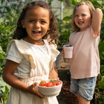image of children with eco friendly tableware, kids dishware made from plants