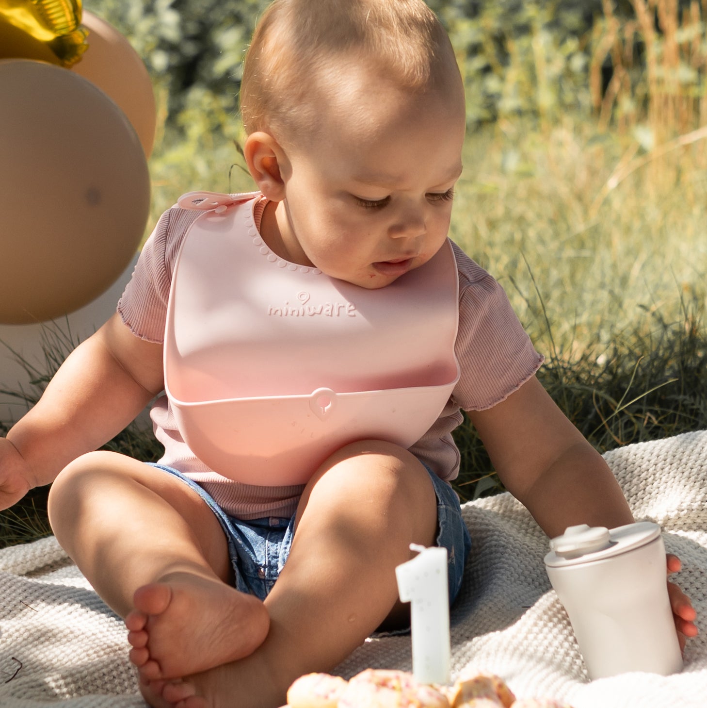 image of child with miniware products